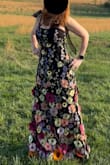 Wore to a vineyard for sorority moms outing (I'm 54) and received SOOOOO MANY compliments on how striking the dress is. I was concerned when ordering if it would fit (especially the length), but the medium was perfect (I'm usually a size 6 or 8 in other brands) Wore 4" heels w/ a 1" platform & the dress never hit the ground (was prob 1.5" above the ground.) Wore with a strapless bra (if you're small busted, you prob don't need one as the dress torso is pretty fitted.) Because I am larger busted, I found that the organza shoulder straps did loosen over time during the night & I re-tied them twice (maybe I could have double tied? Or maybe I'll have the seamstress sew some black straps on under the pretty organza straps?) I brought the dress to the cleaners before wearing it for "press only" since it shipped in a bag (only $10 to do this - SO worth it to have the flowers lay a little flatter - esp those on the side seams.) The dress is truly **STUNNING** with the embroidered and 3D flowers - very versatile too. - Lisa R.