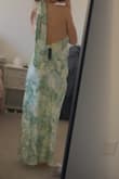 I initially ordered a M, but it was too big. The small fits me well. Material is nice and I love the color. Decided to return because I liked other dresses better - Pietra S.
