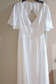 It's a beautiful dress; the fabric is smooth, shiny, and soft. I feel very comfortable in the dress. It has excellent volume. It's perfect for my civil wedding. - Alejandra A.