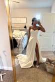 I did not end up buying this dress, but it was my favorite out of all the wedding dresses I tried on. I ended up going with another dress (from Lulus), which fit the vibe of our wedding reception more. I don't think many people realize how GREAT Lulu's wedding dresses are! I will never not spreading the word! This dress is BEAUTIFUL, amazing quality, the slit is perfection! And literally a fraction of the cost bridal boutiques charge! I am VERY impressed!! - Deepali A.