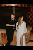 I ordered this dress for my wedding (along with a couple of others) & as soon as I put this one on, I knew it was the one! I did have to have it altered to fit a little better. It was too long on me (I'm 5'3) and the top was a little big, but other than that, it was perfect! I loved the slit in the leg (it made for some fun, sexy photos) & the fact that I didn't have to wear a bra! Plus, the loose fit around the stomach was flattering, and I was able to enjoy my wedding meal (pasta!) without worrying about looking bloated! It was classy yet had a little bit of sex appeal with the deep V and open back! I HIGHLY recommend this dress!! - Marissa M.