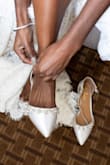 I think these shoes served perfectly for my wedding day! I got married to a short king & didn't want extra tall heels for the ceremony. These shoes gave bridal and fancy without feeling stuffy or uncomfortable to walk in (the wedding was outside and I had to walk down a number of stairs to get to the ceremony space). I have narrow feet and ankles and I loved that the strap was adjustable for a comfy fit. These worked great with the dress I got from Lulu's too. This was the perfect one stop shop for major parts of my bridal look. - Nicole B.