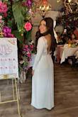 I wore this dress for my bridal shower and oh my god what a perfect dress! I'm also an unusually/awkwardly skinny person who usually has a lot of trouble finding clothing/dresses that fit me properly because I'm just weirdly small and skinny and all the wrong places, but his dress fit like a glove! I my only complaint world probably that I feel like it needed a string or a seat strap or something connecting the shoulders because there were times that I felt that it would fall off my shoulders! But once I really settled into the dress and got comfortable, even that passes! This dress is genuinely stunning! So simple, but elegant! - Faith G.