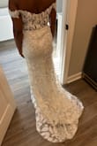 The dress fits nicely, a little loose in the shoulder part. Overall, rate this dress 8.5/10. It will be perfect for a bride on a budget or beach wedding. - Moesha W.