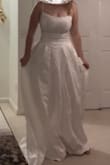 Dress is a LOT better quality than I was expecting for the price! Truly beautiful. Unfortunately just doesn't work with my bust, but otherwise truly beautiful, and the floral pattern is stunning. The only downside I might add would be the straps, as they didn't feel super duper durable if I was to wear this all day though out wedding festivities. - Bethany B.
