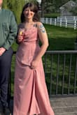 The dress is a little wrinkly, but I think that's just because of the silk fabric. It fit well, and I got a lot of compliments on it. - Heather K.