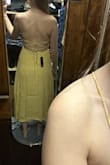 Difficult to tie the back without help, but very cute once on! The lining in the front is thick enough I didn't need silicon cups. - Megan K.