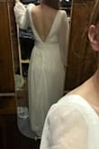 This dress has little silicone pieces to keep the shoulders in place, but it was not enough for me. The deep V in the front and back meant when the shoulders slipped, they slipped ALL the way off. - Megan K.