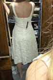 This dress looked much cuter in person. The fabric was thick and nice quality. My only complaint is the straps are not adjustable. - Megan K.