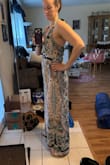 I was so excited to discover the length of this jumpsuit is PERFECT, so that I can still wear heels and it's not too short! I didn't want an ankle-length jumpsuit, and this proved to be full length! It's a little large in the bodice, but I'd rather get that part taken in than risk a Large being too short. - Amy D.