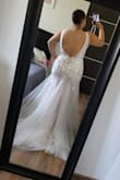 It's the most beautiful wedding dress I've ever tried on!!  The fabric quality is excellent, and it fits your body shape perfectly. I recommend it if you're a curvy woman. I can't wait to wear it on my wedding day. - Alejandra M.