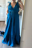 The material was great, and I loved the pockets! The dress was too long. Even with 4" heels on, I would have needed to hem it at least 2-3". The zipper was also quite difficult to manage. I loved that the shoulders untied and I could re-tie them to fit my short torso, but unfortunately, when I got the torso to hit right there was so much extra fabric for the ties it looked messy. Also, beware the sides are kind of low, necessitating a sticky bra/nipple cover type situation if you don't want bra showing. - Katie T.