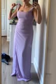 This dress didn't fit my petite frame very well. It was way too long. Even with 4" heels on I would have needed to hem at least 2-3" to make sure it didn't drag the ground. The torso was too long, and I would have needed to shorten the straps by at least half an inch, if not more, to make sure they stayed up. The zipper was difficult as well. The material was good! - Katie T.