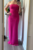 I absolutely love this dress! The material is amazing, the fit is perfect for my body (except the length.) I wish there were a petite version! Even with 4" heels I still need to hem the dress 2-3" to ensure it doesn't drag the ground. The color is beautiful! I love the grippy/sticky material on the top of the dress that helps it stay in place. - Katie T.