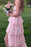 My daughter really loved this dress for her senior prom. It fit well and was comfortable. She liked that it had a slit and was easy to move around in and not right fitting all the way to the floor. - Sarah E.