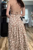 I got this dress for a garden party themed wedding. This dress is BEAUTIFUL! I let lulus guess my size through the questions you answer and I got an xs. I am 5'4 and 110 pounds, but I have a little belly due to having a baby, and my hips are a bit wider. But this dress hugs me in all the right places!! I should also add that I am VERY flat chested. I'm not even sure I would fill a 32B lol, but this dress is so flattering!!! I am really happy with this purchase. - Kierra S.
