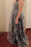 It's a little too long for me, but it's very beautiful and I can't wait to wear it. I bought a M and it fits perfectly. - Sara S.