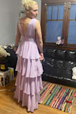 I bought 3 dresses, and this tiered maxi dress was the winner! The layers fell great and had a wonderful flow to the gown. I did have to take the top of the sleeves in a bit for a more snug around my chest, and ordered sticky cup inserts to help fill it out better. Got lots of compliments and definitely will wear again! :) - Lindsey P.