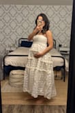 A reviewer said the dress makes you look pregnant. Which sold this dress to me. I'm in my second trimester of pregnancy and this dress is so cute, so I might wear it for my baby shower. - Mai M.