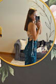 I was really excited about this dress, but unfortunately, it was too low for me to be comfortable in. The back was really pretty. Honestly, it looks a lot better on the model than in person. This dress just wasn't for me. - Reagan T.