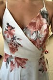 I was looking for a dress for my rehearsal dinner in Mexico.  I returned so many short white dresses, but then I found this one and I'm obsessed with it! I tend to have a hard time finding dresses that fit because I'm tall, athletic, but super small chested and I'm usually between sizes.  The tie factor on this dress works perfectly for me! I bought it in a medium and couldn't be happier!  It's super flowy, but so classy and pretty.  The only issue is the snap closure on the chest doesn't align on me once it's on, but it can easily be moved.  Other than that, I'm so happy I sprung for this dress!!!!! - Melissa G.