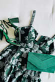 I'm 5'4, 24 in waist, XS fit perfectly. This dress is gorgeous in person- the fabric is amazing!  The green is gorgeous.  Perfect for Spring!!!! - Anne H.