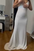 The material is very thick, not cheap at all! Surprised for how much the price is, I love that even though it's thick, it's very stretchy and comfortable. It hugs your body well. Length is too long for me, but that can easily be altered. - Carol Y.