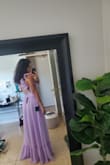 This dress is absolutely gorgeous! I have a quinceanera to attend this weekend and I couldn't be happier with how this dress turned out. I'm obsessed with the ruffle details on the shoulders and down the back, such a beautiful touch! I'm having the bottom hemmed slightly (as expected since I'm on the shorter side) and I'll also be adjusting the V-neck to make it less deep. Overall, this is my new favorite dress and I can't wait to wear it! - Deanna F.