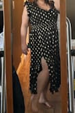 Love the dress. Had to get it altered slightly. The lady is going to open the seam at the shoulders and take them in. Was plugging a little too low for comfort. - Joelle R.
