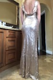 I was worried it would be too long or too tight. With my 5 inch heels the length is perfect. No stepping on the dress but can only see my toes while I walk. Dress all and all is stunning. - Kaylie R.