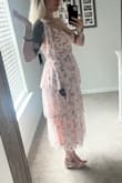 When looking at the reviews for this dress, it looked gorgeous on all the ladies, but I noticed each was quite petite, so I wanted to drop some photos for any taller/non-petite gals wondering if this dress would work for them! Measurements are 5'10", 185lb at the time of photos, and 39-33-44 if anyone is similar and wondering how it may look!

I love the dress, and as someone with a narrower waist and wider hips, it fits that body type well. The waist area is stretchy, so that's really nice, but as has been mentioned in other reviews, there's not a ton of cup room or support. If my boobs were any bigger at all it wouldn't fly lol. As it stands, I think it's gorgeous, feminine, and spring-timey and just perfect for a tea party this weekend! At 5'10" it's exactly tea-length.

The only issue I have with this dress is some mis-aligned stitching right in between the breasts. The right cup area isnt sewn perfectly so it looks a bit off-center but its not the end of the world. - Morgan P.