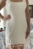 The size small dress was a little small, and I sent it back for the medium; the fabric was light linen. I liked it but sent it back. - Lisa C.