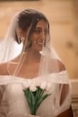 I ordered the Arienne White Off-the-Shoulder Mermaid Maxi Dress in size XS for my wedding, and it was absolutely everything I dreamed of and more. As the bride, I couldn't have been happier; from the moment I put it on, I knew it was the one. The material felt high-quality and elegant; the fit was flawless, and the off-the-shoulder design gave it such a romantic touch. The color was a beautiful, crisp white that looked stunning in photos and in person. - Veneesha R.