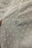 This dress was super cute for my medical school graduation until I looked down after wearing it for 2 hours and noticed that the top layer of fabric was ripping at the seem in multiple places on the dress. The color is so cute, but beware of the ripping fabric! - Charlotte U.