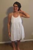 I got a Medium and it fits great. I haven't worn it yet but looks like it will be great. The straps are adjustable so it seems like if I shorten them enough I can wear a strapless bra. I don't remember it being too sheer. I thought it might tent, with my larger chest but it didn't really do that. It needs to be washed and dried and I'm sure the wrinkles will come out. - Sheryl C.