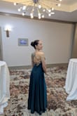 This dress is beautiful, light, and it fits perfectly!
It flows when you walk, and you can show your leg. I got a lot of compliments wearing it, I love it!
Be prepared to iron it, I spent almost 1 hour doing it, and it's very long. I'm short, so I had to wear high heels; otherwise, you will need to hem it. - Taty T.