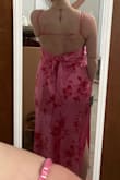 Really tight in the chest and not stretchy at all. Love the color, and I think it's really cute. Only issue I have with it is that the tie in the back loosens within minutes because the fabric is slick ,so I'll have to pin it in place or I'll be adjusting it all night long. - Natalie D.