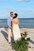 I tried on quite a few dresses before picking this one for my Florida beach elopement. It fit like a glove, was lightweight and packable without having to press it. I had a few inches taken off the bottom and purchased sticky cups to support me. I was a nervous about it being a little see through but the photos came out perfect. It was breezy and it flowed perfectly in the wind! I received so many compliments in this dress! I felt sexy and beautiful! - Carrie H.