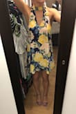 I loved this dress online but I was pretty indifferent when I tried it on. I ordered both a small and medium (small pictured) and didn't try on the medium. The colors aren't as vibrant in person and the arm holes go down further than expected. I was able to pull down the strap of my strapless bra to keep it from showing but if you wear your bra like normal it will definitely show. Besides that there wasn't anything wrong with the dress, it just didn't fit right. Unfortunately I ended up returning both sizes. - Kelsey S.