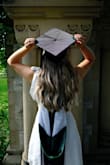 I ordered this dress for graduation and I'm so happy I did! I received so many compliments on it. I felt so pretty while still feeling that the dress wasn't too revealing/was mature enough for a graduation ceremony/pics. I'm usually between a medium and a large, so I ordered both. The medium probably would've been too tight on my chest, but I honestly don't remember because as soon as I put it on, I realized it was way too short. The large fit perfectly and was the perfect length. The bows are such a cute detail and I didn't think it was too hard to tie them nicely. The zipper on the back of the dress is definitely a little tricky even if the dress fits well--I needed help zipping it almost every time I put it on. The dress itself was thick and didn't show nude undergarments--would probably show black a little as most white dresses would. Overall, it's such a nice quality, beautiful dress for a reasonable price! - Lily