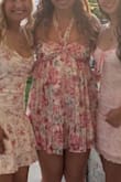 I loved this dress. After a while my neck started to hurt because of the tie but I'm thinking it was just tied too tight. Other than that the design was super cute and got so many compliments on the dress. - Kailey M.