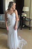 I'm usually an XS but it was too loose on me. I had the dress altered a good amount which included the back changed into a deeper V, a bustle added and padded cups stitched in. I was obsessed with the way the dress fit me and loved the detail of the beading! It was my perfect wedding dress >u - Cassie C.
