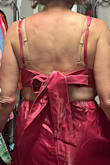I'm not in shape anymore due to multiple surgeries so it definitely does not look good from the back. As a 48 year-old this dress is not for me. - Jody L.