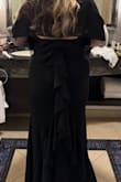The material and the fit are perfect, and the bustle and bow are the perfect touch to such a simple dress. - Courtney F.