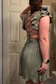 This dress is absolutely stunning. It fit me perfectly, and I did the size guide quiz, which helped me decide. Material is also great quality. - Anna S.
