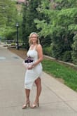I bought this dress to wear to my college graduation, and it didn't disappoint. It fit perfectly and accentuated my curves. Very comfortable. Even though it is designed to fit on the snugger side, it wasn't restricting when walking. - Amy B.