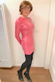 This is a sexy dress. It is a beautiful, pink color, hugs your curves, shows off your legs, and is also comfy. I'm not always a fan of sequins, but this dress does it right. And did I say that the pink color is gorgeous? Recommended. - Jo N.
