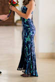 This dress was so beautiful! I was a bit nervous to get it just cause it's a little different than something I would usually buy, but it is so beautiful and stunning! It definitely makes you look good! I had to hem the slit a few inches cause it was a bit to high for my liking. The dress was the perfect length, and I got so many compliments! - Reagan T.
