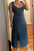 I was very excited for this dress, but the sizing just wasn't right for me. Because it was too large the dress seemed really boxy, didn't hug my curves in a flattering way, and the slit was barely visible. It's extremely stretchy, so I would recommend sizing down if you think you're between sizes, especially if you don't have a large bust. The top was way too loose for me to wear it, and also very, very long for my height. I would say you have to be fairly tall or wear platform heels for this dress to look like the model. Overall, I wasn't a fan of how this looked to me - Erin M.