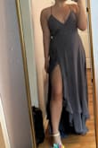 Overall, I thought this dress had a really pretty silhouette, and I liked the color. It felt a little tight in the ribs for me, but I feel like a larger size would have me swimming in the material. The slit is only visible with intentional leg placement for me. It was also just too long. With high heels, it might have just barely been the right length, but I was tripping while trying it on. The straps and ties for this dress were also extremely difficult to put on alone, and I ended up needing help just to get in. For a taller person, this may be perfect, but I found it too difficult to put on for it to become a go-to dress for me - Erin M.